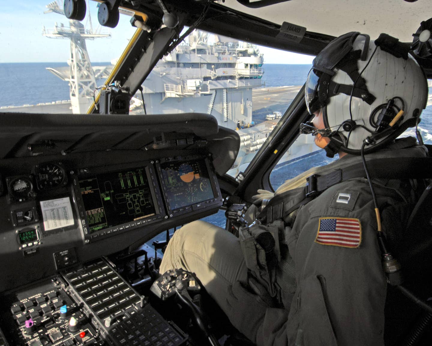 message-editor%2F1573114174500-us_navy_061217-n-9708h-239_lt._jarrod_groves_prepares_to_land_an_mh-60s_helicopter_assigned_to_the_chargers_of_helicopter_sea_combat_squadron_two_six_hsc-26_aboard_the_nimitz-class_aircraft_carrier_uss_theodore_roosevelt_cvn.jpg