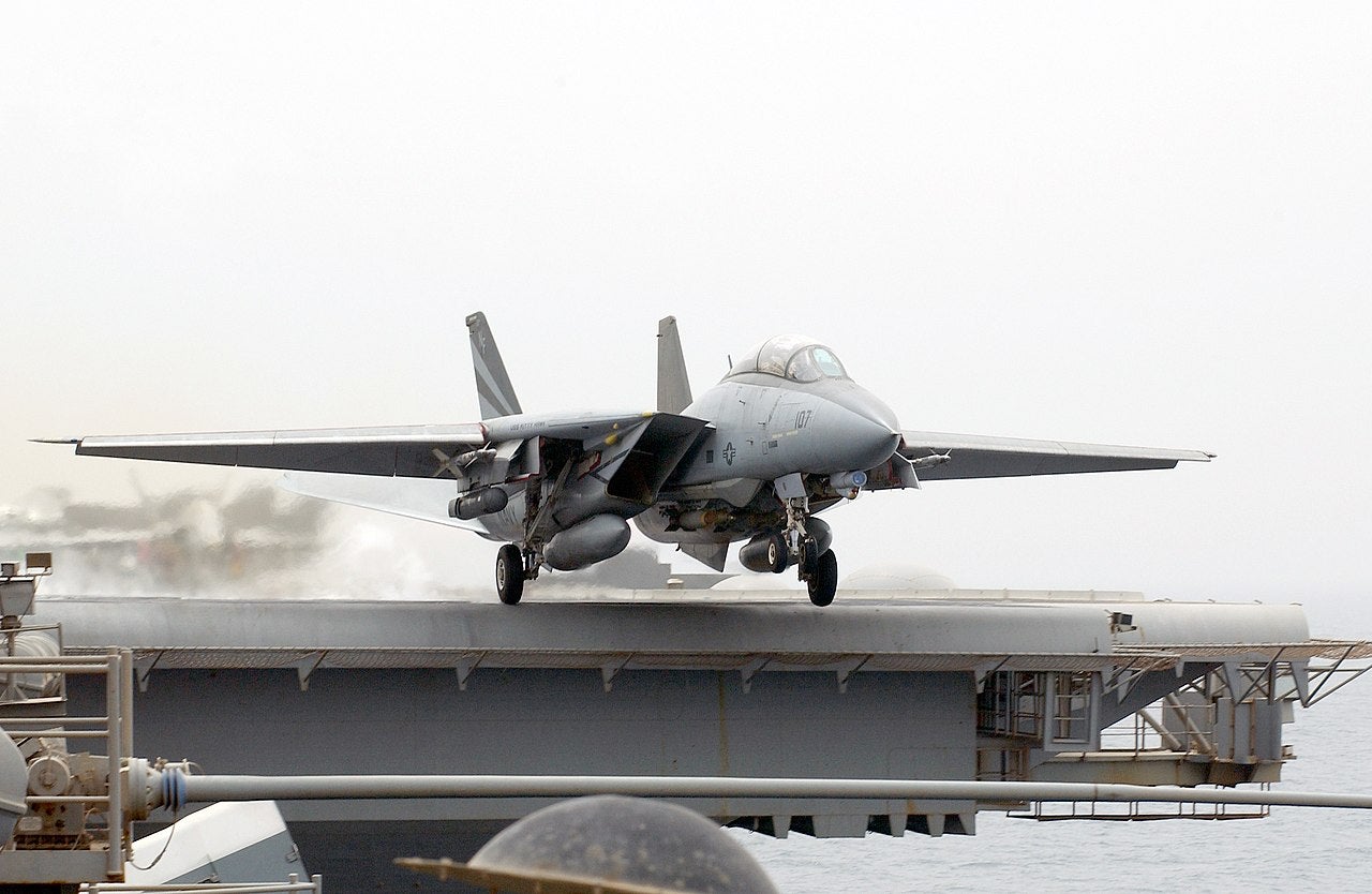 message-editor%2F1643400324772-1280px-us_navy_030322-n-1810f-003_an_f-14a_tomcat_fighter_aircraft_launches_from_one_of_four_steam_powered_catapults_aboard_uss_kitty_hawk_cv_63.jpeg