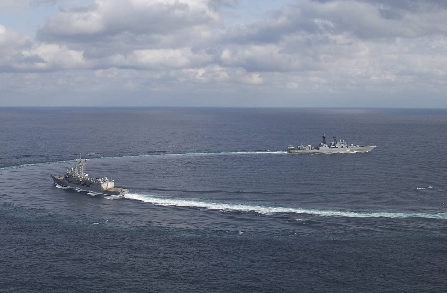 message-editor%2F1644862060619-us_navy_031109-n-8590g-002_uss_vandegrift_and_russian_destroyer_marshal_shaposhnikov_dd_543_maneuver_in_formation_during_a_russian_passing_exercise_passex_as_a_joint_foreign_naval_exercise.jpg