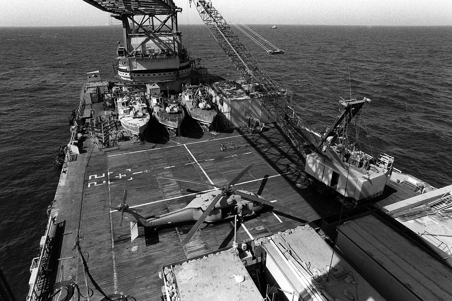 barge_hercules_with_helicopter_and_pbrs_onboard.jpg