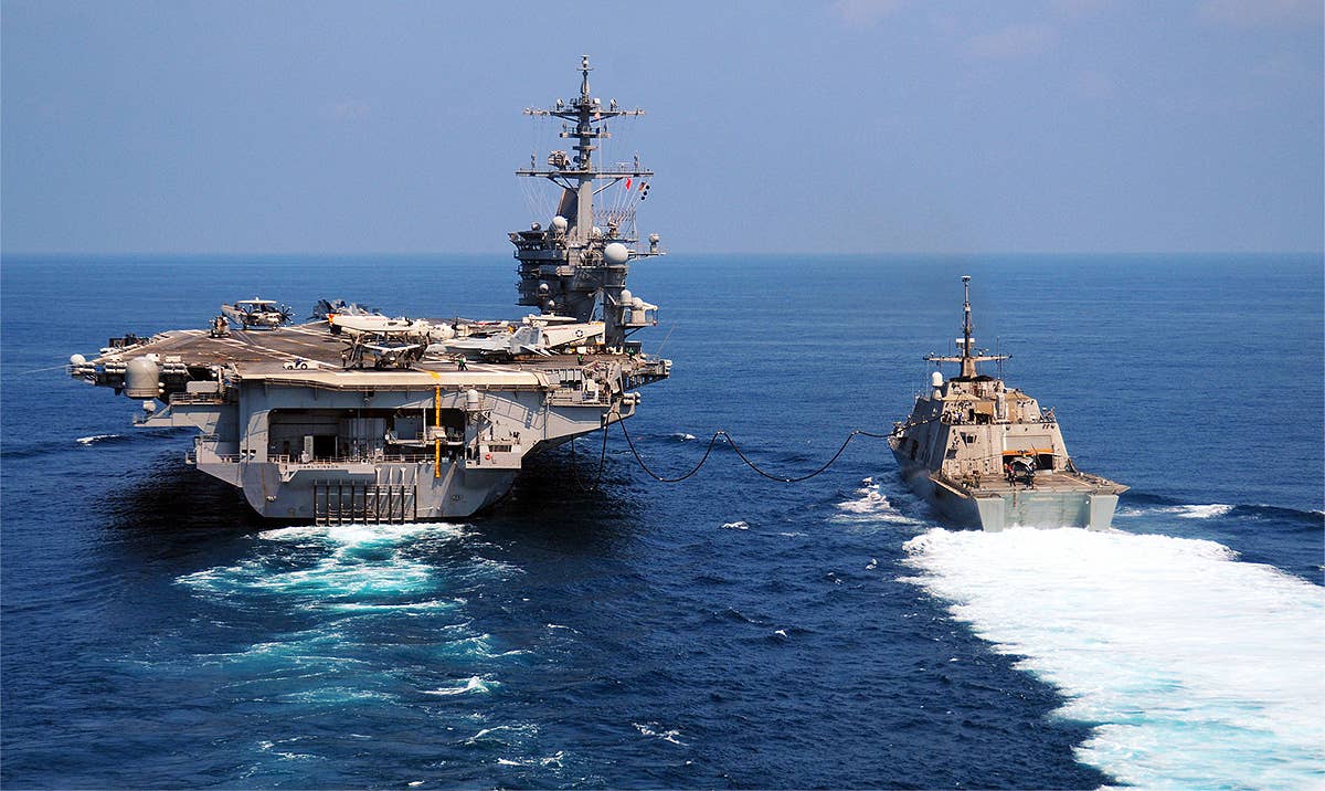 us_navy_100407-n-0808v-229_the_littoral_combat_ship_uss_freedom_lcs_1_comes_alongside_the_nimitz-class_aircraft_carrier_uss_carl_vinson_cvn_70_for_a_refueling_at_sea.jpg