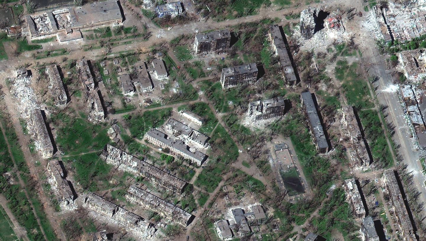 Apartment blocks in Mariupol damaged and destroyed after two months of fighting over the coastal city. 