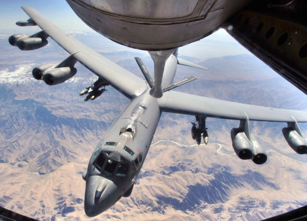 Bombers, like this B-52 Stratofortress ready to refuel from a KC-135 Stratotanker over Afghanistan, provide coalition ground forces on-demand close air support. Bombing support is just one of the services Airmen provide their sister services and coalition partners in Afghanistan and Iraq. The bomber is from the 2nd Bomb Wing at Barksdale Air Force Base, La. (U.S. Air Force photo/Master Sgt. Lance Cheung)