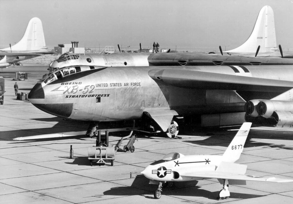 Forward fuselage detail of Boeing XB-52, with Northrop X-4 and Convair B-36 in background. (U.S. Air Force photo)