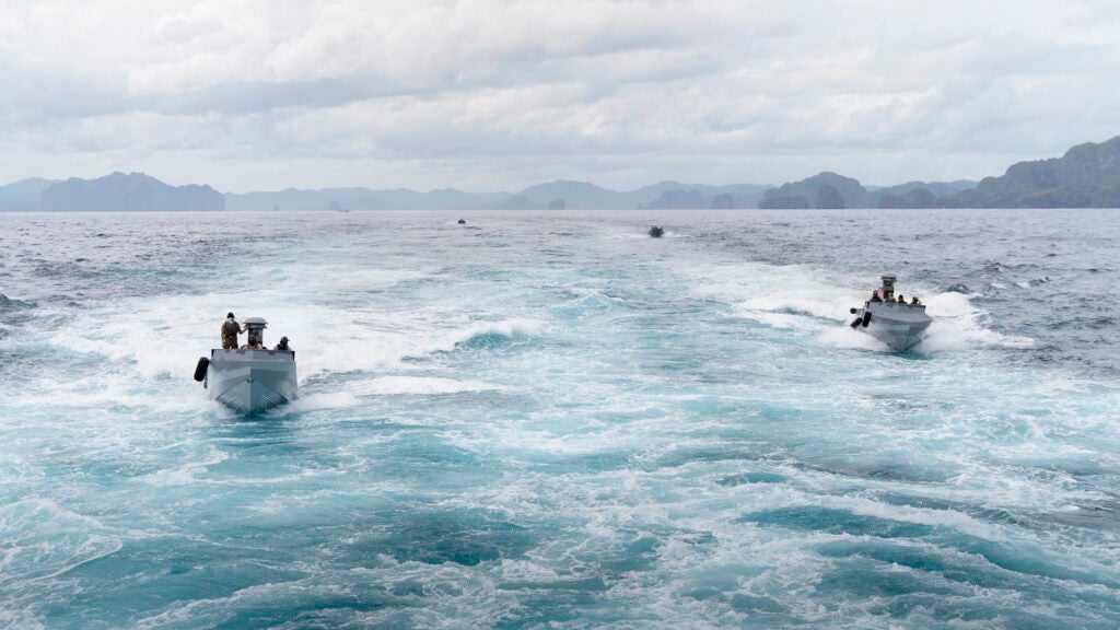 Members of the Philippine Navy Special Operations Group, U.S. Navy SEALs with Special Warfare Group, and Australian Operators with 2nd Commando Regiment conduct maritime security operations together during exercise Balikatan 22 off the coast of Palawan, Philippines, April 7, 2022. Balikatan is an annual exercise between the Armed Forces of the Philippines and U.S. military designed to strengthen bilateral interoperability, capabilities, trust and cooperation built over decades of shared experiences. Balikatan, Tagalog for 'shoulder-to-shoulder' is a longstanding bilateral exercise between the Philippines and the United States highlighting the deep-rooted partnership between both countries. BK22 is the 37th iteration of the exercise and coincides with the 75th anniversary of U.S. Philippine security cooperation. (U.S. Marine Corps photo by Sgt. Mario A. Ramirez)