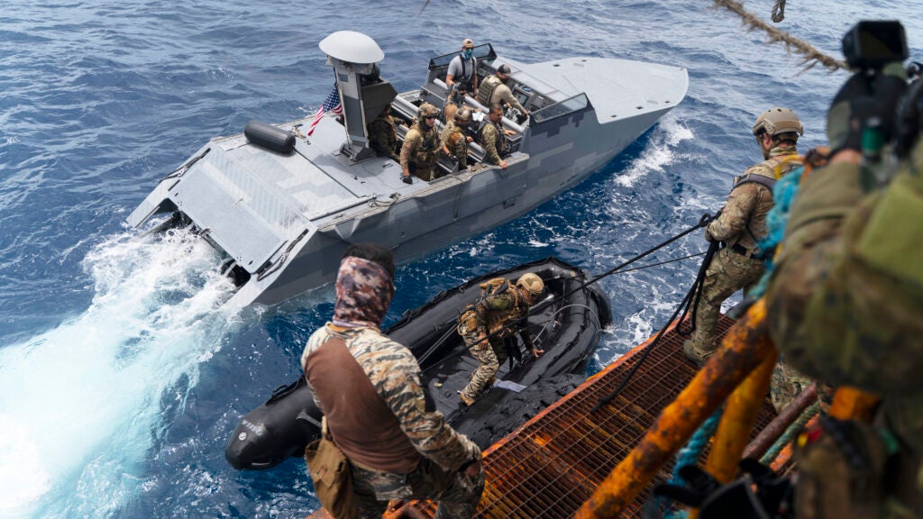 Members of the Philippine Navy Special Operations Group, U.S. Navy SEALs with Special Warfare Group, and Australian Operators with 2nd Commando Regiment conduct maritime security operations together during exercise Balikatan 22 off the coast of Palawan, Philippines, April 7, 2022. Balikatan is an annual exercise between the Armed Forces of the Philippines and U.S. military designed to strengthen bilateral interoperability, capabilities, trust and cooperation built over decades of shared experiences. Balikatan, Tagalog for 'shoulder-to-shoulder' is a longstanding bilateral exercise between the Philippines and the United States highlighting the deep-rooted partnership between both countries. BK22 is the 37th iteration of the exercise and coincides with the 75th anniversary of U.S. Philippine security cooperation. (U.S. Marine Corps photo by Sgt. Mario A. Ramirez)