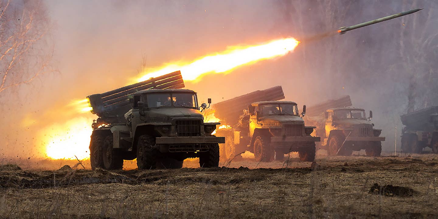 A BM-21 Grad rocket artillery launcher fires an 122mm rocket.
