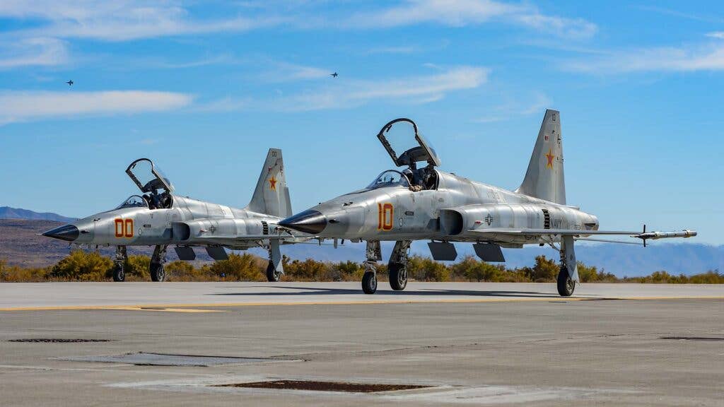 A pair of VFC-13 F-5Ns head out on a sortie at Fallon. Soon the unit will be equipped with F-16Cs. (Credit: Jamie Hunter)