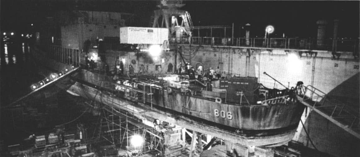 The destroyer USS&nbsp;<em>Higbee</em>&nbsp;receives repairs in a floating drydock at Subic Bay, Philippines, in around May 1972. <em>U.S. Navy</em><br>