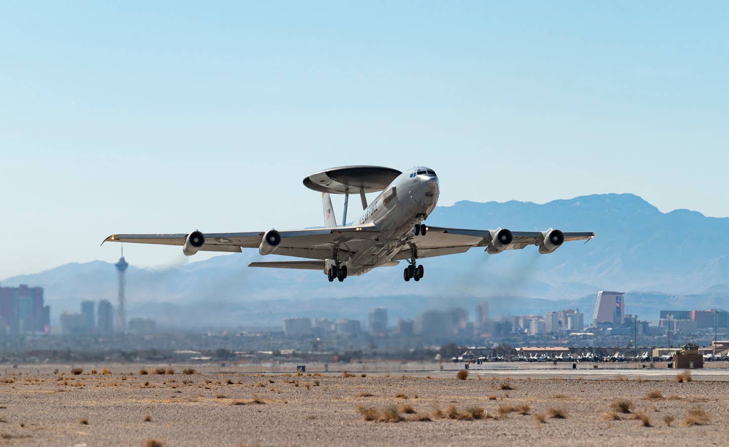 An E-3A Sentry AWACS aircraft takes off from Nellis Air Force Base in Nevada during the Red Flag 22-1 exercise in February 2022. <em>U.S. Air Force photo by William R. Lewis</em>