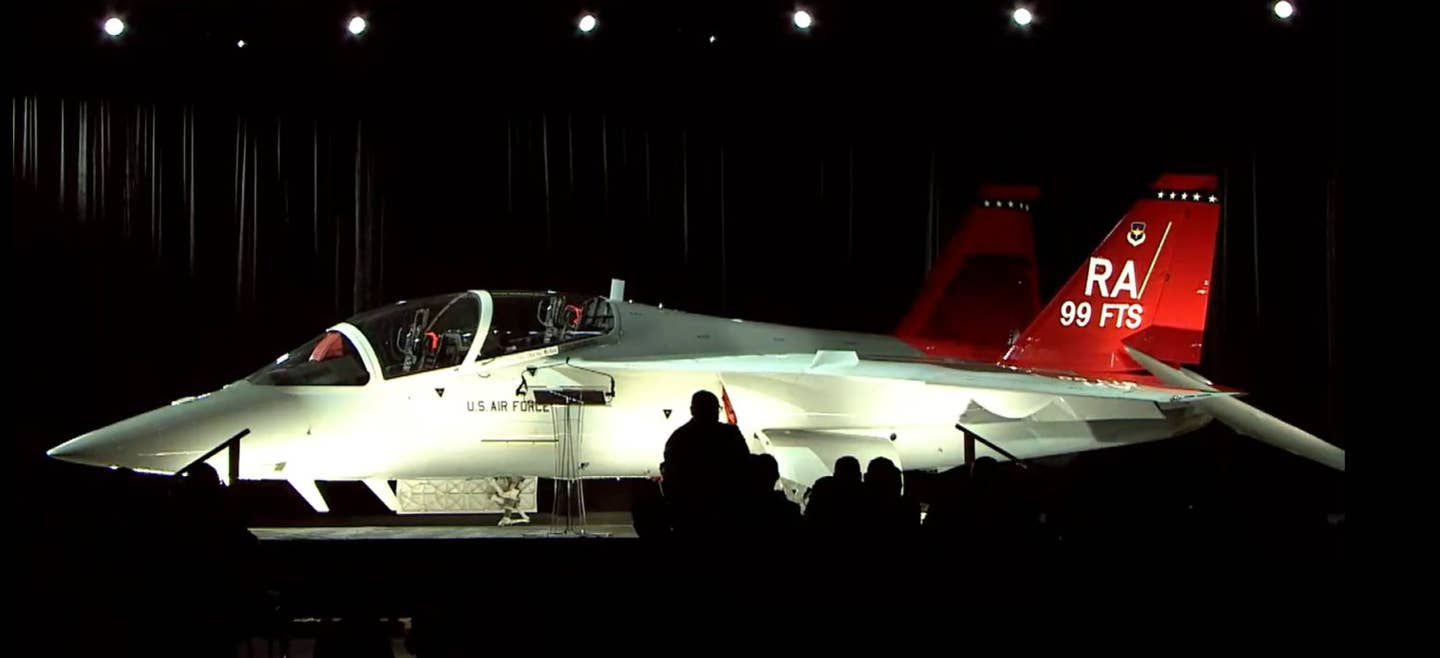 Air Force officials and invited guests get their chance to take a look at the first EMD T-7A for the U.S. Air Force. <em>Boeing Screencap</em>