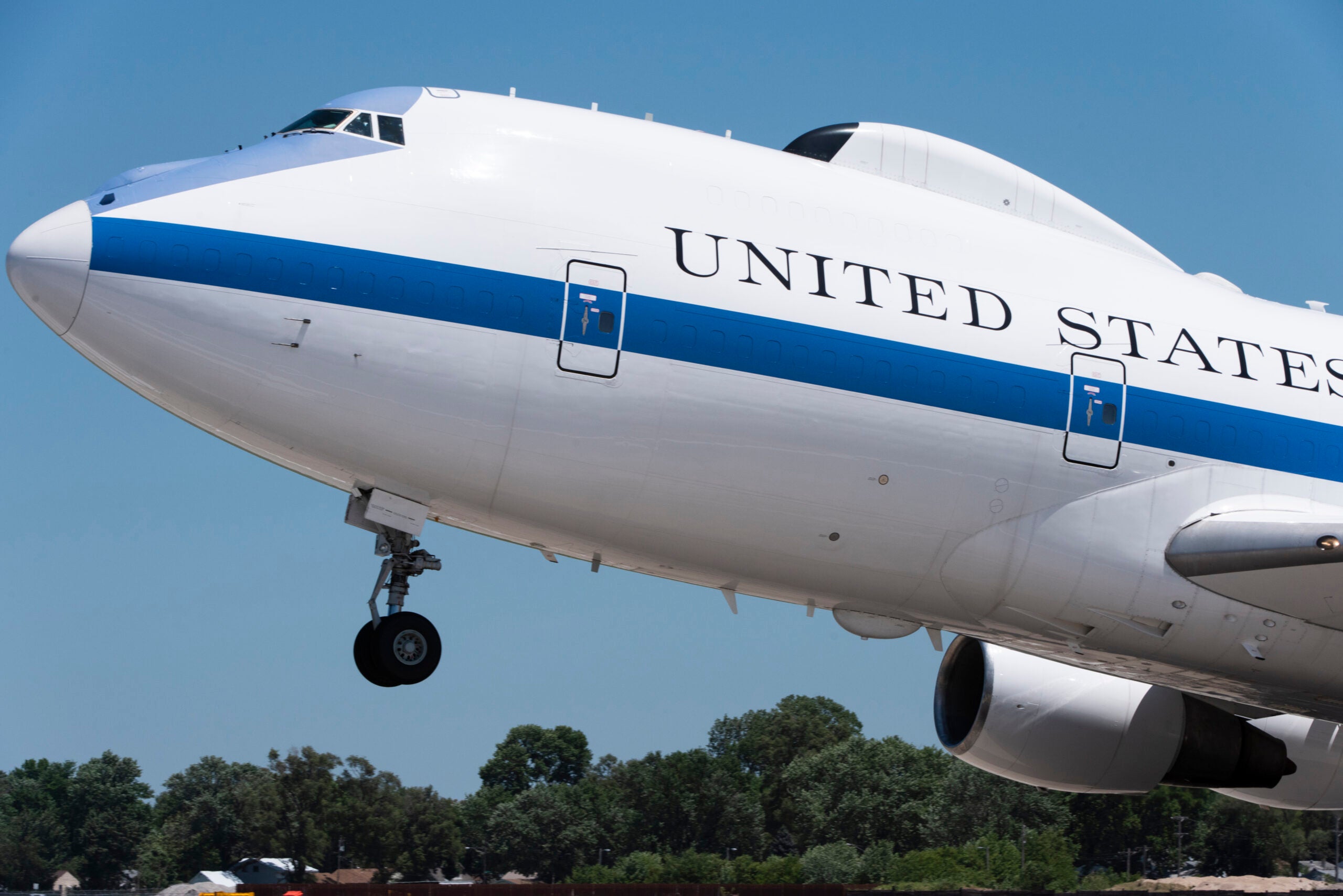 A U.S. Air Force E-4B National Airborne Operations Center aircraft takes off from Offutt Air Force Base, Nebraska, July 10, 2019. In case of a national emergency or destruction of ground command and control centers, the aircraft provides a highly survivable command, control and communications center to direct U.S. forces, execute emergency war orders and coordinate actions made by civil authorities. (U.S. Air Force photo by Staff Sgt. Jacob Skovo)