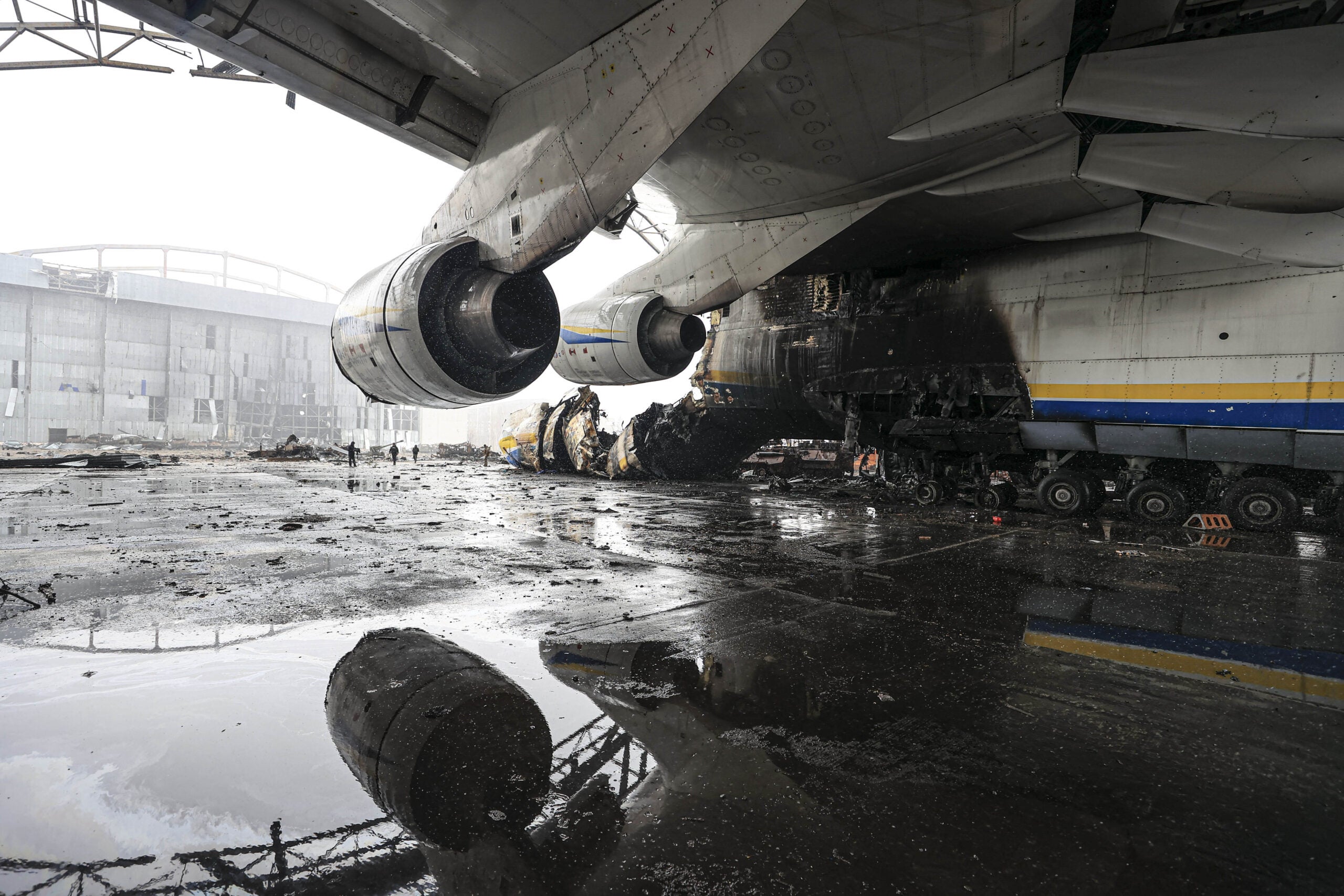 HOSTOMEL, UKRAINE - APRIL 03: A view of the wreckage of Antonov An-225 Mriya cargo plane, the world's biggest aircraft, destroyed by Russian shelling as Russia's attack on Ukraine continues, at an airshed in Hostomel, Ukraine on April 03, 2022. The wreckage of the world's largest cargo plane Antonov An-225, which was severely damaged and rendered unusable due to Russian bombardments, was viewed by Anadolu Agency. (Photo by Metin Aktas/Anadolu Agency via Getty Images)