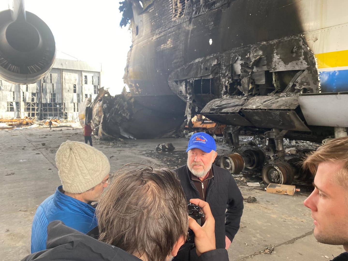 After seeing the destroyed Mriya for the first time, Oleksandr Halunenko is interviewed by the <em>New York Times</em>. <em>Photo courtesy of the Halunenkos</em>