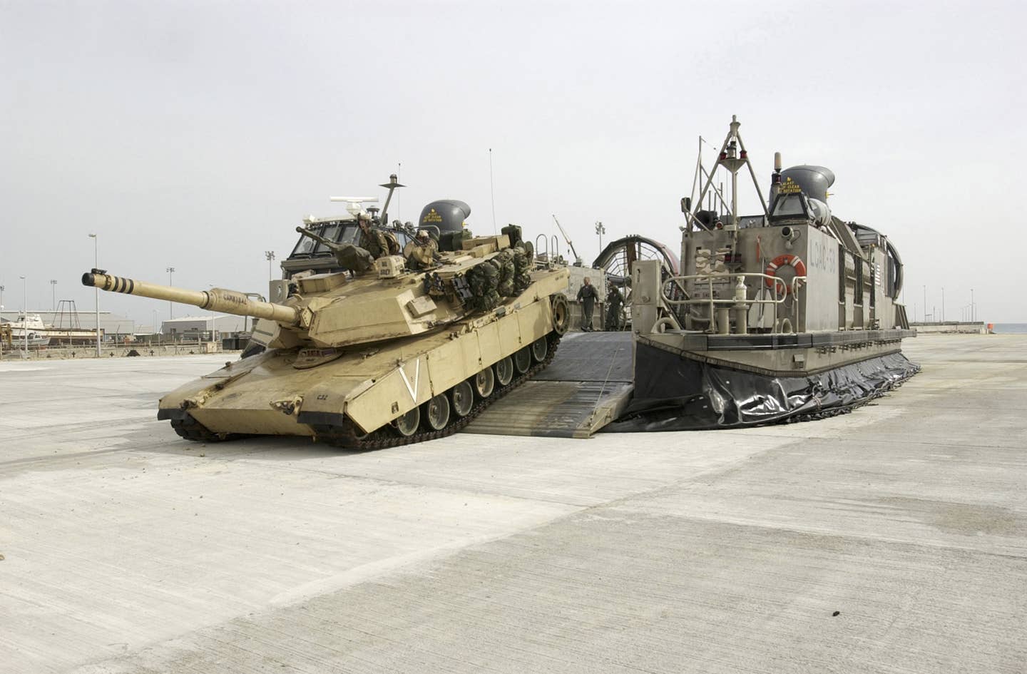 A USMC M1 Abrams tank loads onto an LCAC in San Diego. After a long history of heavy armor operations, the Marines are out of the tank business in order for its force mix to align with its new strategy. U.S. Navy photo by Photographer's Mate 1st Class Brien Aho.