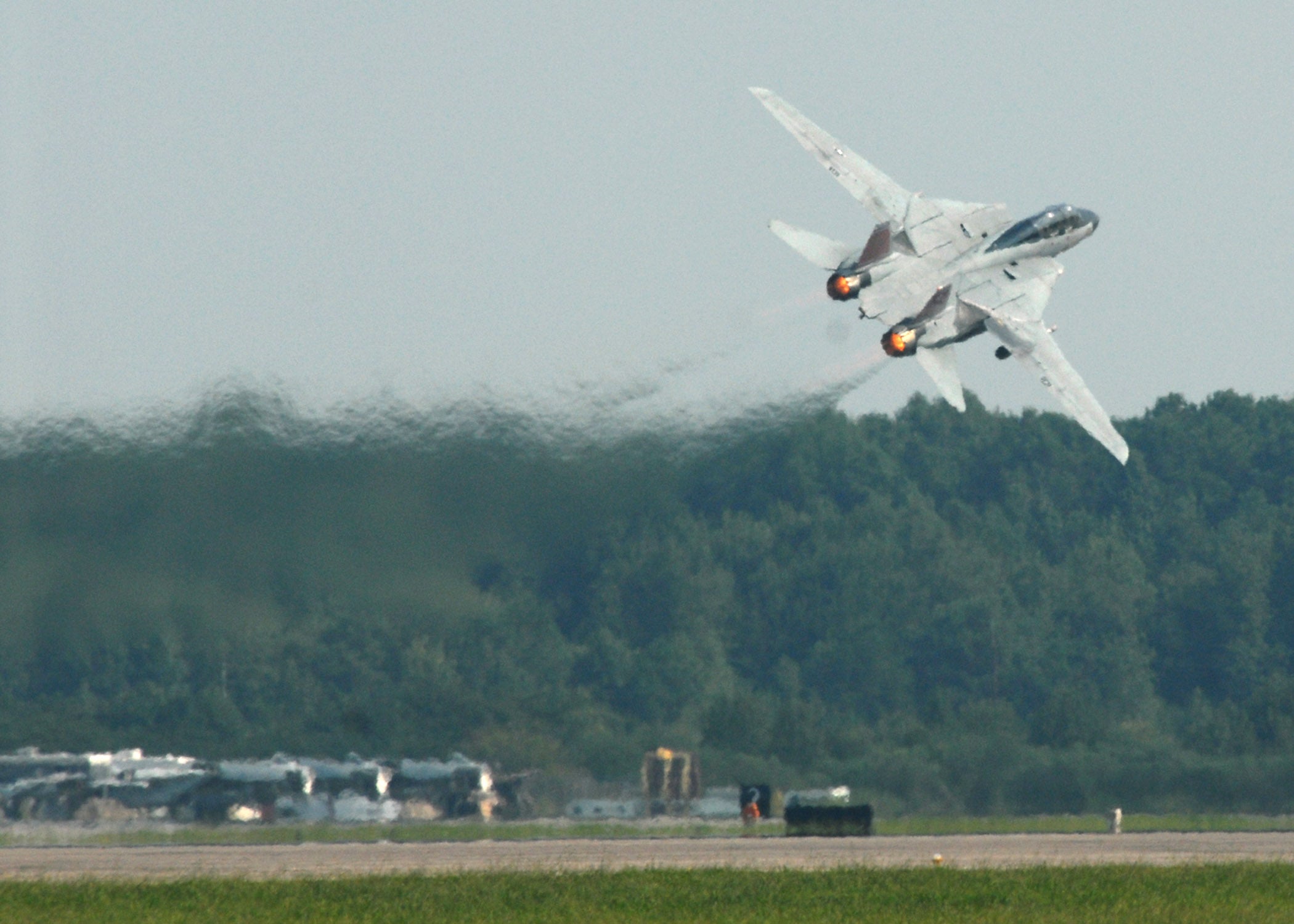 060910-N-1129M-055
Virginia Beach, Va. (Sept. 8, 2006) - An F-14D Tomcat from Fighter Squadron Three One (VF-31) takes off at full afterburner for the last F-14 airshow demonstration ever. The 2006 Naval Air Station Oceana Air Show themed "Salute to the Blue Angels; 60 Years of Aerial Excellence", showcased civilian and military aircraft from the Nation's armed forces, providing lots of flight demonstrations and static displays.  U.S. Navy photo by Mass Communication Specialist 3rd Class Julian R. Moorefield III (RELEASED)