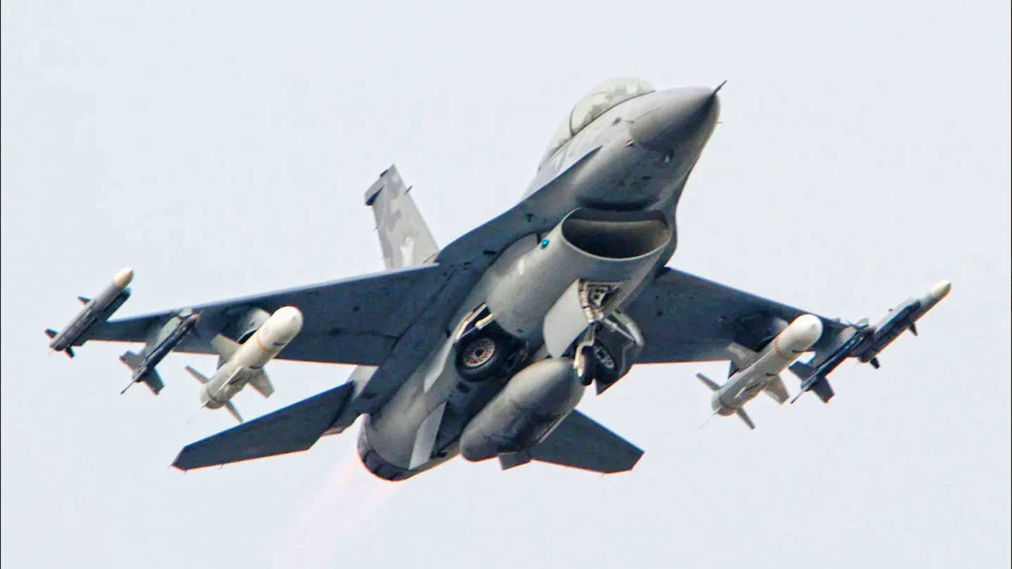 A Republic of China Air Force F-16 fighter jet takes off armed with live AGM-84 Harpoon missiles, as well as air-to-air missiles. This would be among the assets used by Taiwan to defend against an amphibious invasion from the mainland.&nbsp;<em>CHIANG YING-YING/AP</em>
