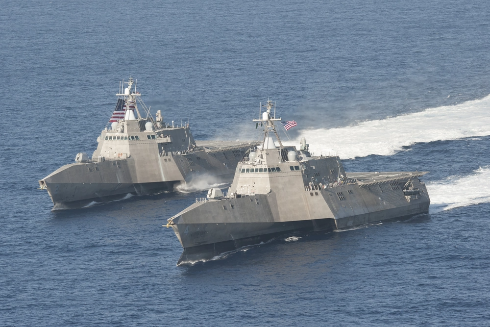 The littoral combat ships <em>USS Independence</em> (LCS-2), left, and <em>USS Coronado</em> (LCS-4) are underway in the Pacific Ocean. <em>Chief Mass Communication Specialist Keith DeVinney/U.S. Navy</em>