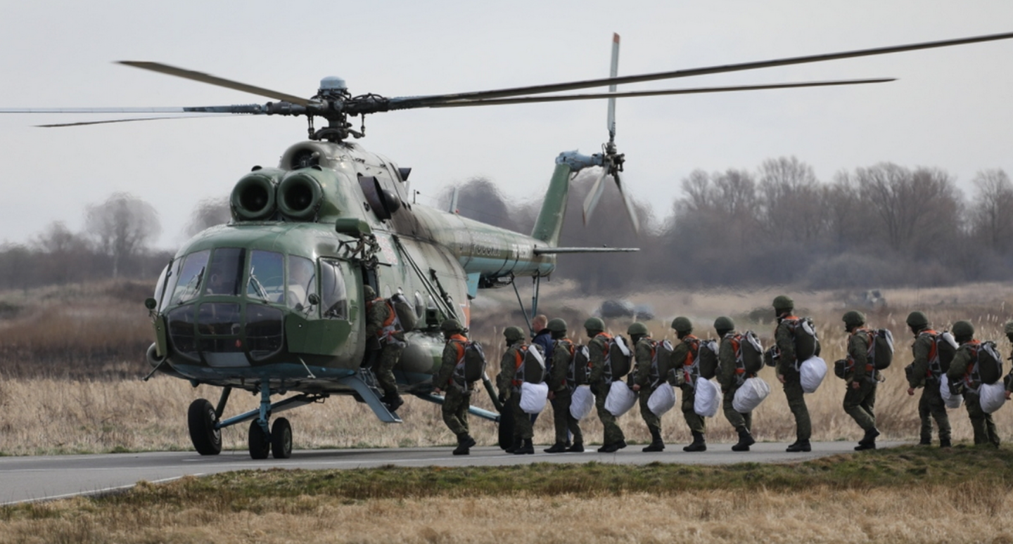 Marines assigned to the Russian Baltic Fleet embark in a Mi-8 Hip helicopter to practice airborne assault. <em>Russian Ministry of Defense</em>