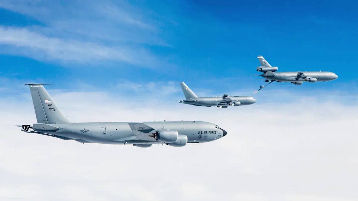 All three of the Air Force's current aerial refueling tanker types. A KC-135 flies in the foreground while a KC-10 prepares to link up with a KC-46 in the background. <em>USAF</em>