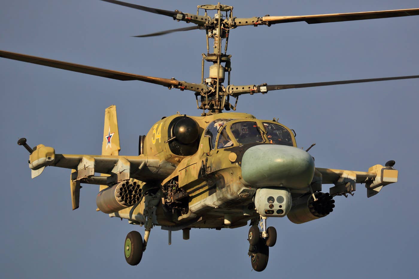 A Russian Aerospace Forces Ka-52, here relatively lightly laden, with just a pair of rocket pods. <em>Fedor Leukhin/Wikimedia Commons</em>