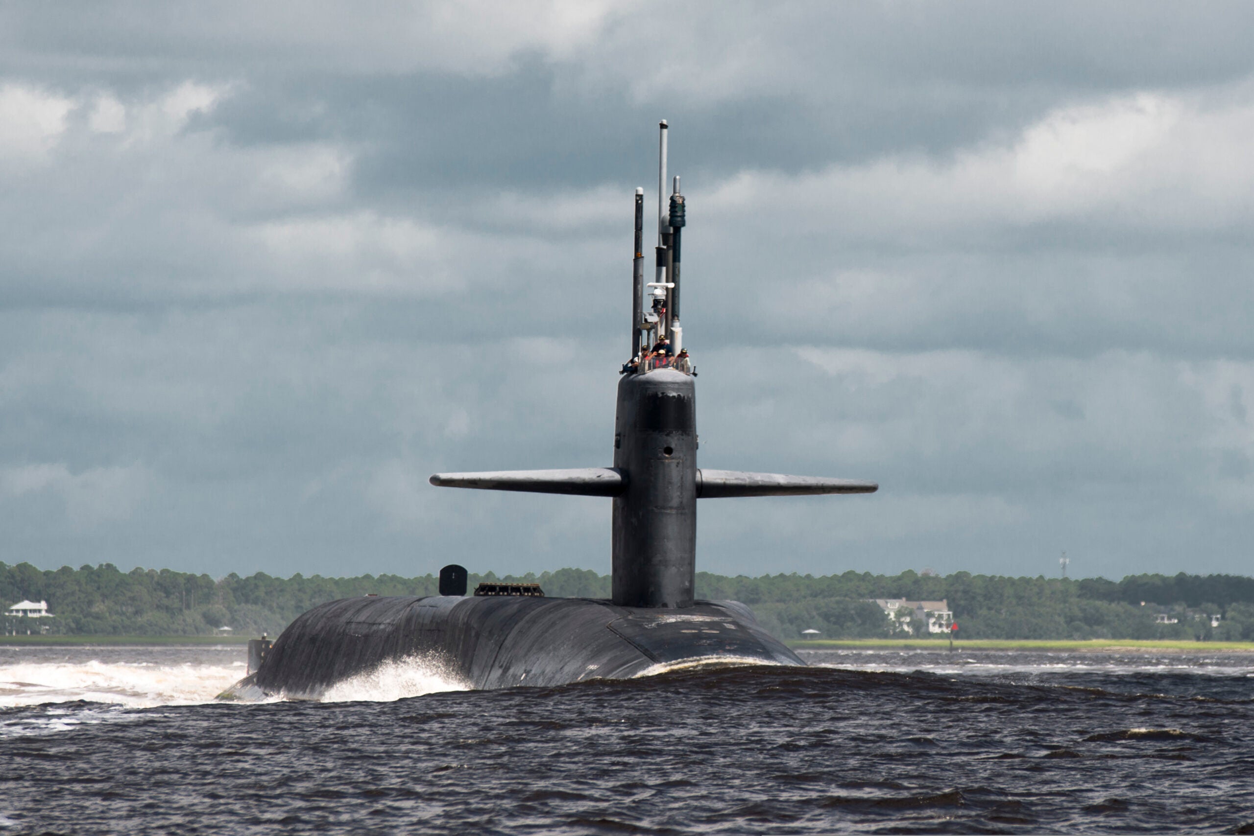130703-N-FG395-083.KINGS BAY, Ga. (July 3, 2013) The Ohio-class guided-missile submarine USS Florida (SSGN 728) departs Naval Submarine Base Kings Bay. Florida will perform routine operations while at sea. (U.S. Navy photo by Mass Communication Specialist 1st Class James Kimber/Released)