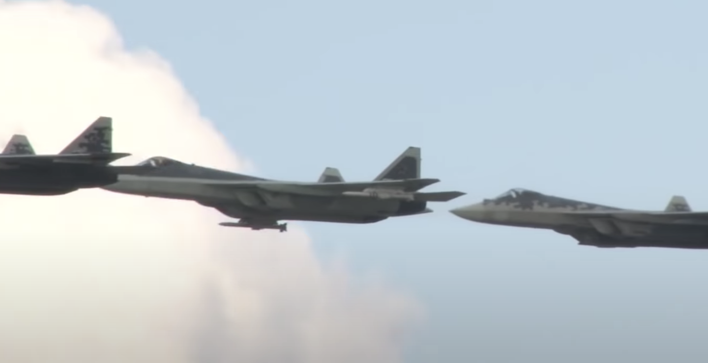 A formation of Su-57s, with the second aircraft apparently armed with new variants of the R-77 missile.&nbsp;<em>RUSSIAN MINISTRY OF DEFENSE SCREENCAP</em>