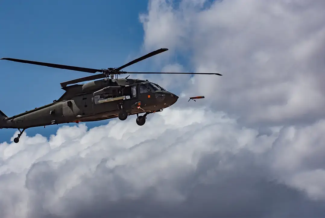 An ALTIUS-600 is launched from a UH-60 Black Hawk at Yuma Proving Ground, Arizona. Courtesy photo provided by Yuma Proving Ground. <em>U.S. Army</em>