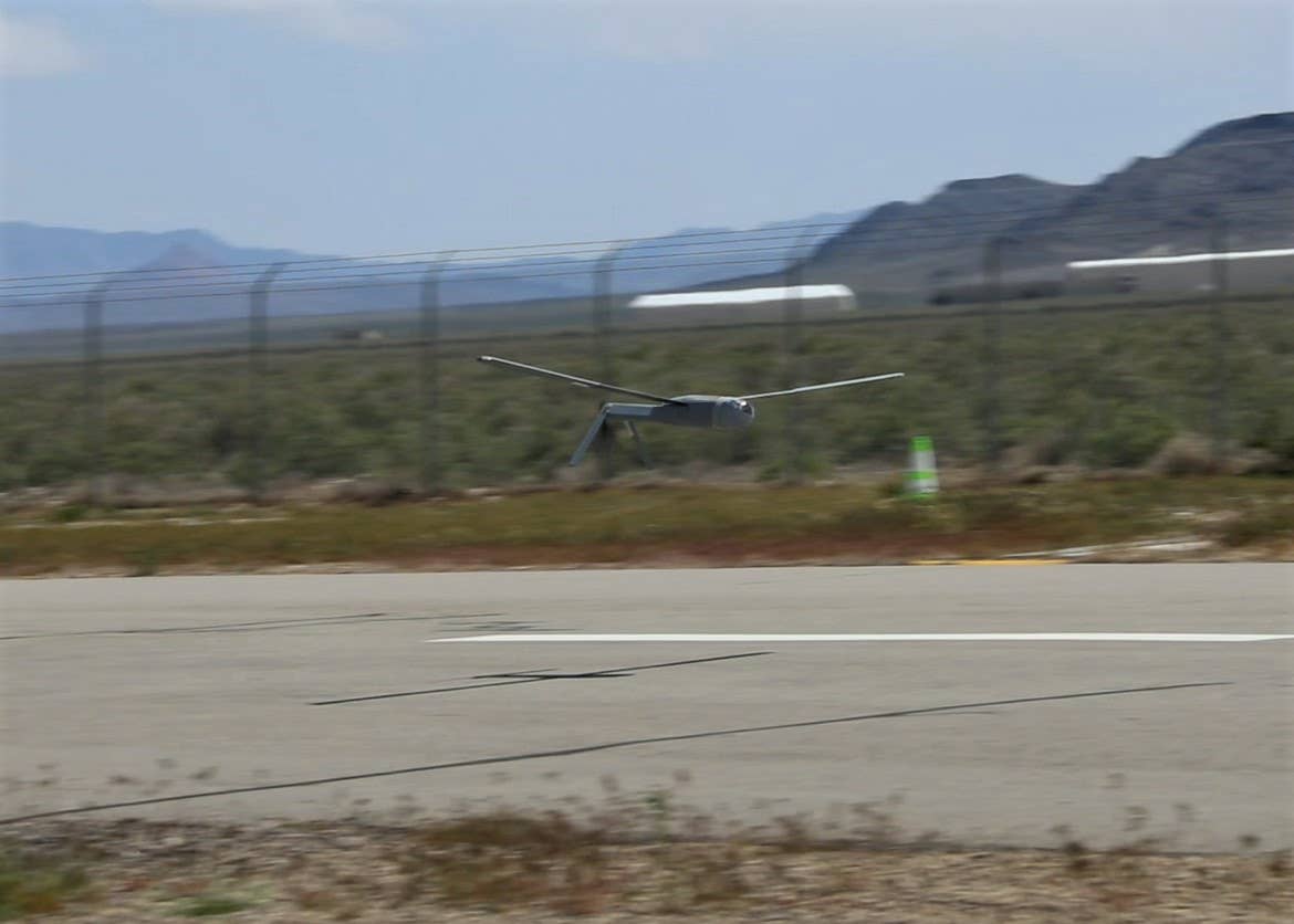 An ALTIUS 600 flies low over a runway at Dugway Proving Ground in Utah. <em>U.S. Army.</em>