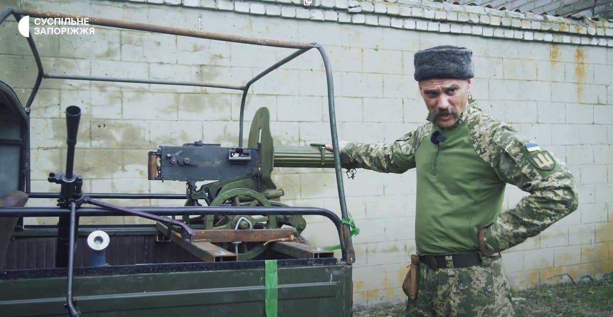A Ukraine Territorial Defense Force member decked out in Cossack style, shows off his M1910 Maxim machine gun. Public Zaporozhye