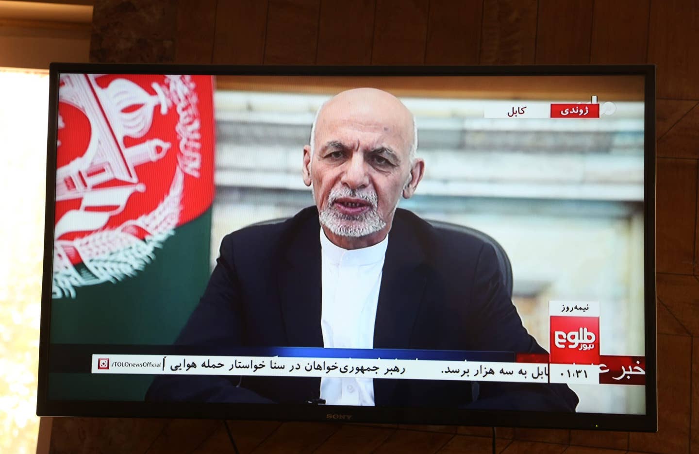 Afghan President Mohammad Ashraf Ghani speaks in a televised address in Kabul, capital of Afghanistan, Aug. 14, 2021. President Ghani on Saturday vowed to prevent instability in his war-battered country amid the intensified fighting and the Taliban's advance toward major cities. (Photo by Rahmatullah Alizadah/Xinhua via Getty Images)