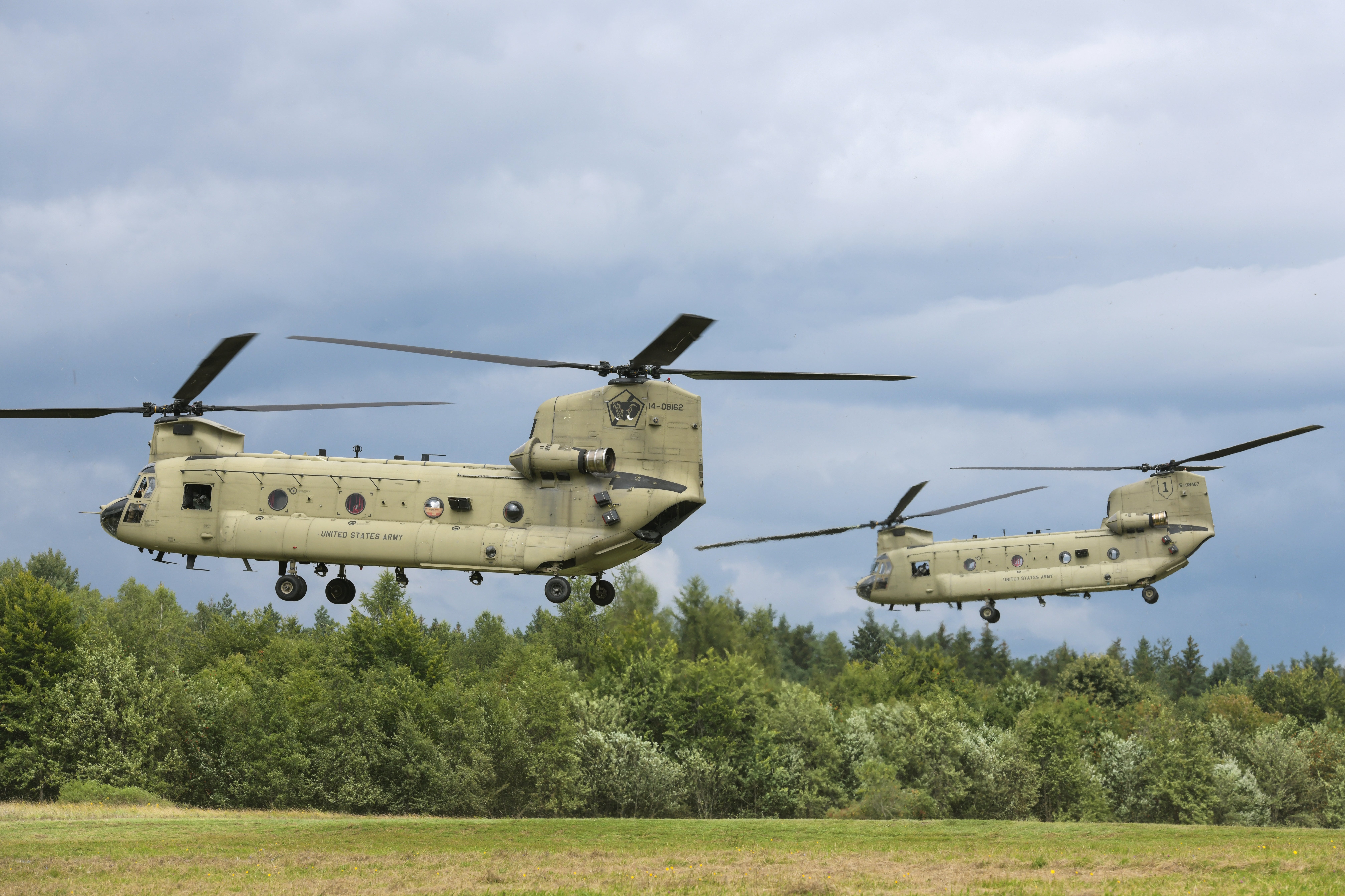 U.S. Soldiers, assigned to 1st Combat Aviation Brigade, 1st Infantry Division, lift off in CH-47 Chinook helicopters prior to aerial gunnery training at the 7th Army Training Command's Grafenwoehr Training Area, Germany, Aug. 4, 2021. 

(U.S. Army photo by Markus Rauchenberger)