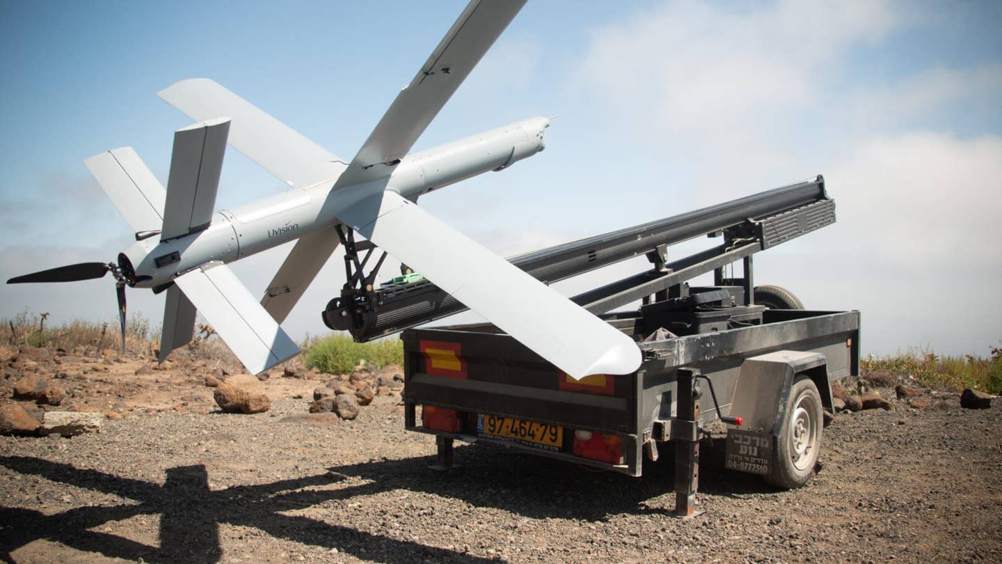 A U.S. Marine Corps Hero-400 loitering munition drone is staged before flight on San Clemente Island, California, May 25, 2022. The Hero-400 is a loitering munition that the United States Marine Corps and other Department of Defense entities are beginning to incorporate into specific mission sets. This initial training flight develops the UAS pilots’ confidence and abilities to be able to operate the Hero-400 in any clime and place, and enabling 3rd MAW to remain a more lethal and ready force. (U.S. Marine Corps photo by Lance Cpl. Daniel Childs)