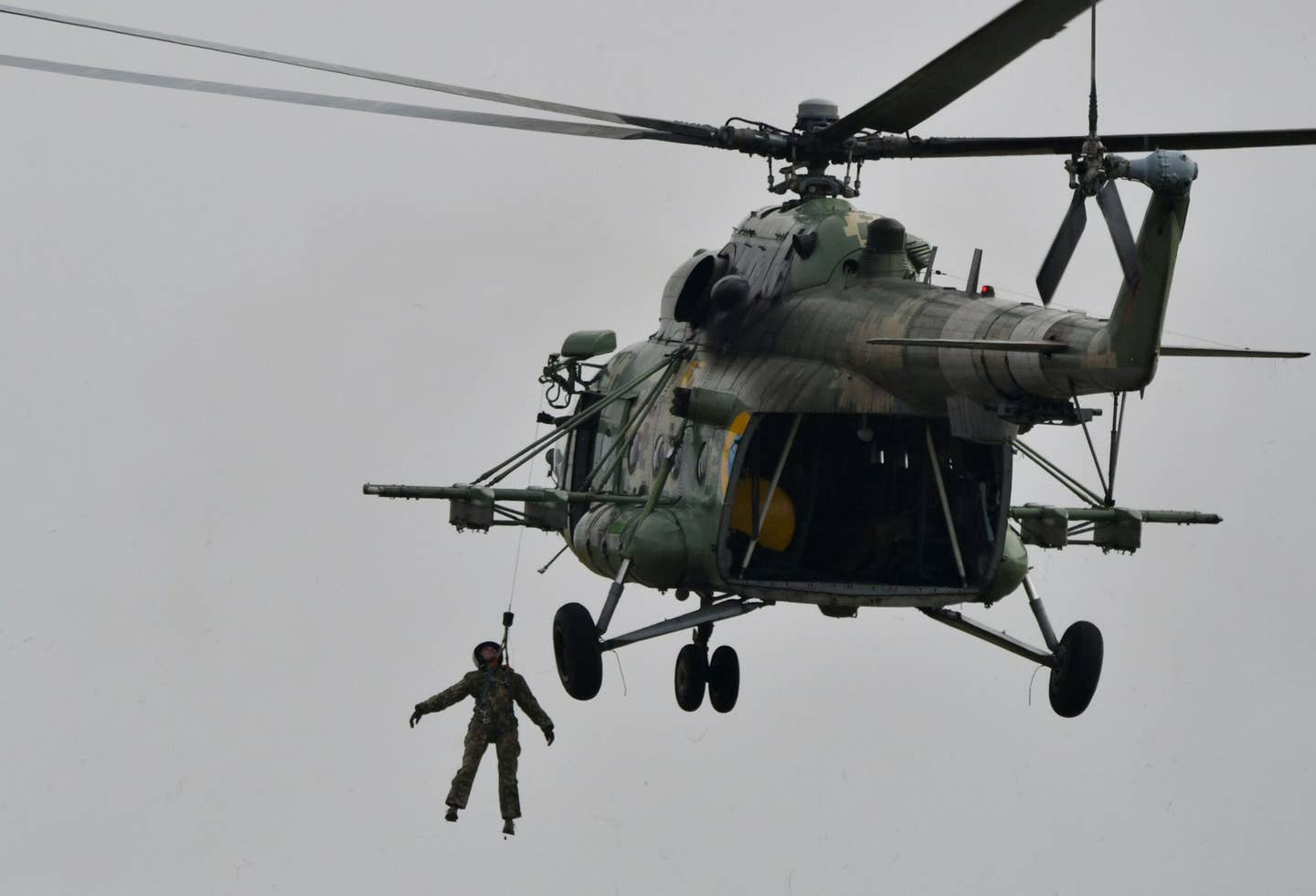 Two Ukrainian Mi-8 Hip helicopters, like this one seen at a 2018 demonstration event, lifted off from Dnipro airfield on the first of several missions to resupply the Azovstal defenders. (GENYA SAVILOV/AFP via Getty Images)