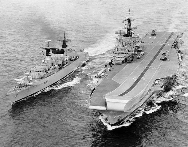 The Type 22 Frigate HMS <em>Broadsword</em> alongside HMS <em>Hermes</em> during the Falklands War. <em>Royal Navy/Crown Copyright</em>