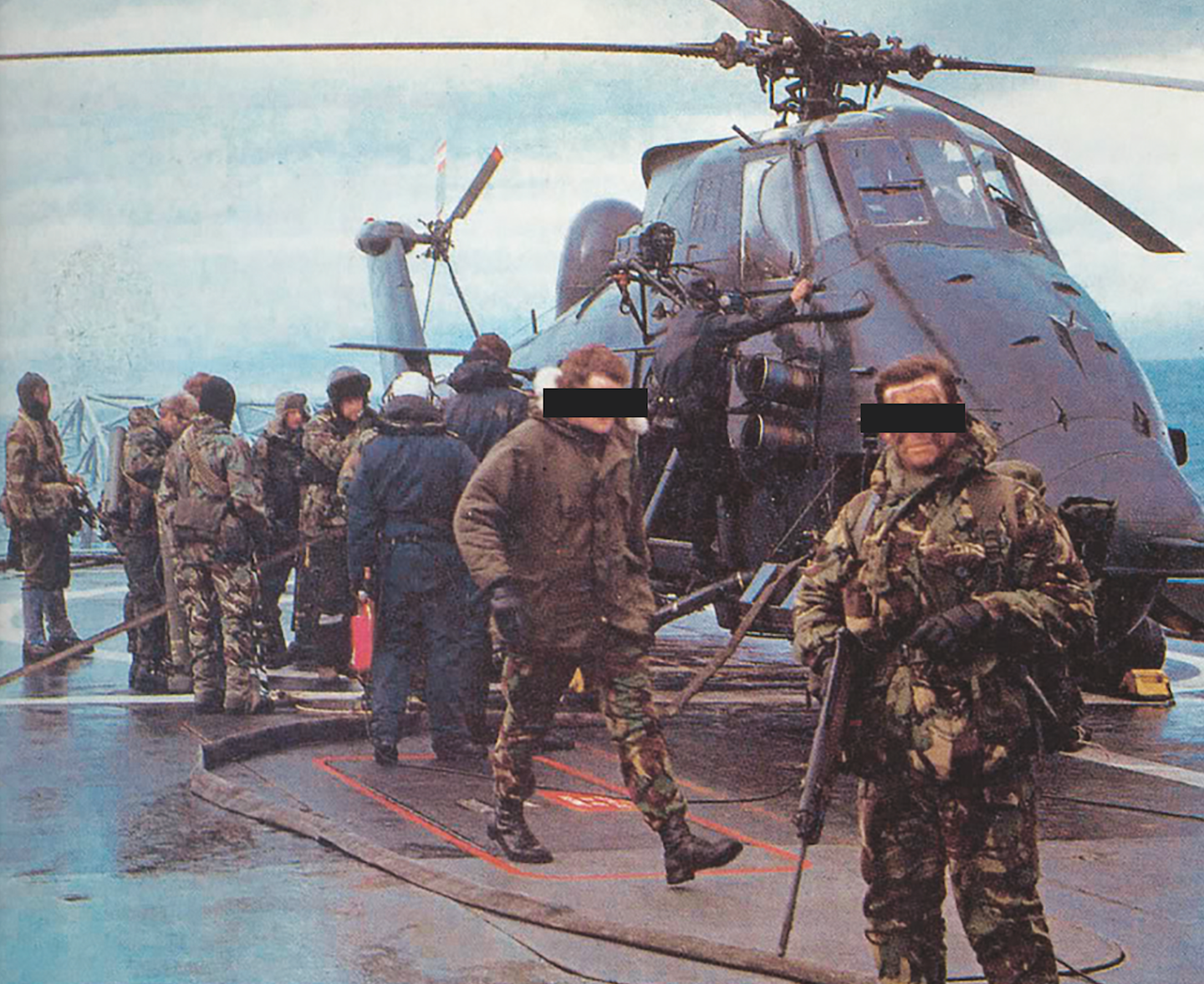 The anti-submarine Wessex Mk 3 helicopter known as ‘Humphrey’ on the flight deck of HMS <em>Antrim</em>. SAS elements are emplaning prior to the assault on South Georgia. <em>via publisher</em>