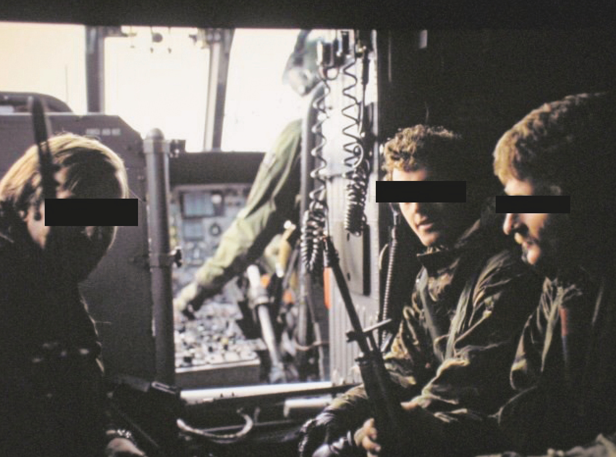Members of D Squadron in a Sea King. “The large helicopter was roomy, but was often dangerously overloaded with troops and kit, as we found out to our cost,” Splash recalled. <em>via publisher</em>