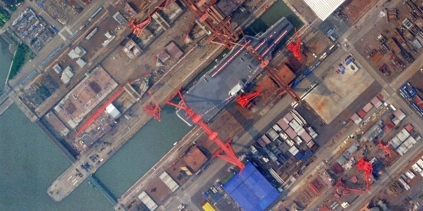 A satellite image showing China's still-under-construction Type 003 aircraft carrier at the Jiangnan Shipyard in Shanghai on June 14, 2022.