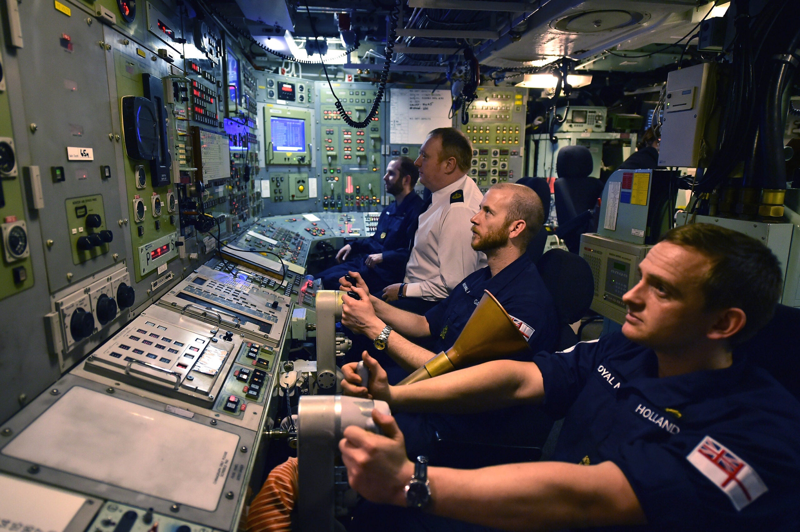 RHU, SCOTLAND - JANUARY 20:  Royal Navy personnel in the control room on HMS Vigilant, submarine on January 20, 2016 in Rhu, Scotland. HMS Vigilant is one of the UK's fleet of four Vanguard class nuclear-powered ballistic missile submarines carrying the Trident nuclear missile system. A decision on when to hold a key Westminster vote on renewing Trident submarine class is yet to be decided senior Whitehall sources have admitted.  (Photo by Jeff J Mitchell/Getty Images)
