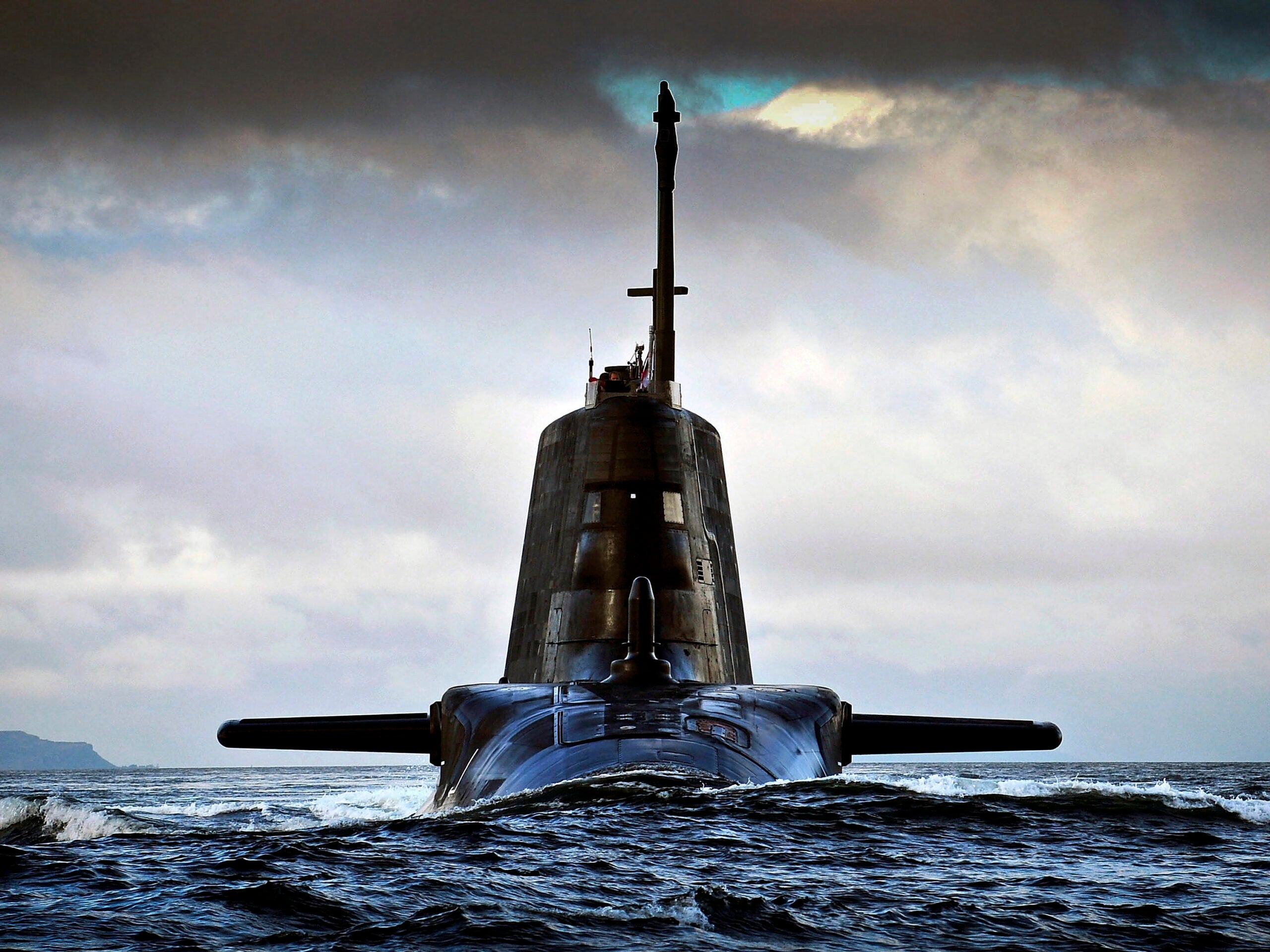 CPOA(Phot) Thomas 'Tam' McDonald; Pictured is HMS AMBUSH returning to HMNB Clyde on the Clyde estuary under moody summer skys Scotland..