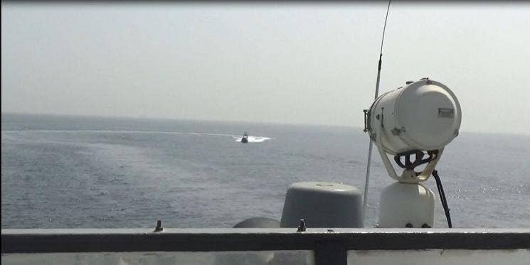 A video screenshot of Iran’s Islamic Revolutionary Guard Corps Navy (IRGCN) operating in "an unsafe and unprofessional manner" near <em>USS Sirocco</em> and <em>USNS Choctaw County</em> in the Strait of Hormuz, June 20. (U.S. Navy image)<br><br>