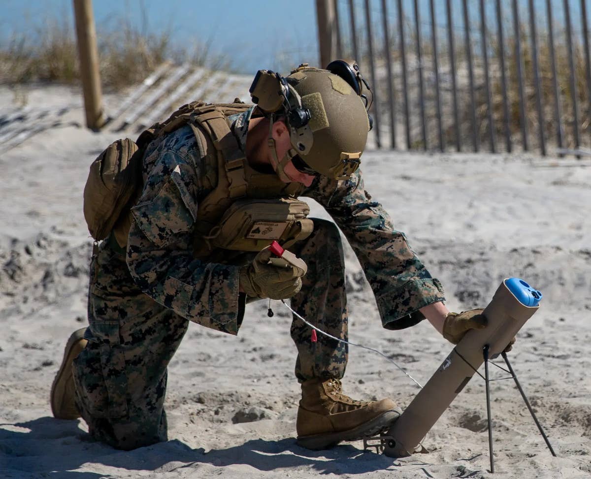 A US Marine prepared to launch a Switchblade loitering munition. The Phoenix Ghost is reportedly a very similar design in both form and function. <em>U.S. Marine Corps / Lance Cpl. Ryan Ramsammy</em>