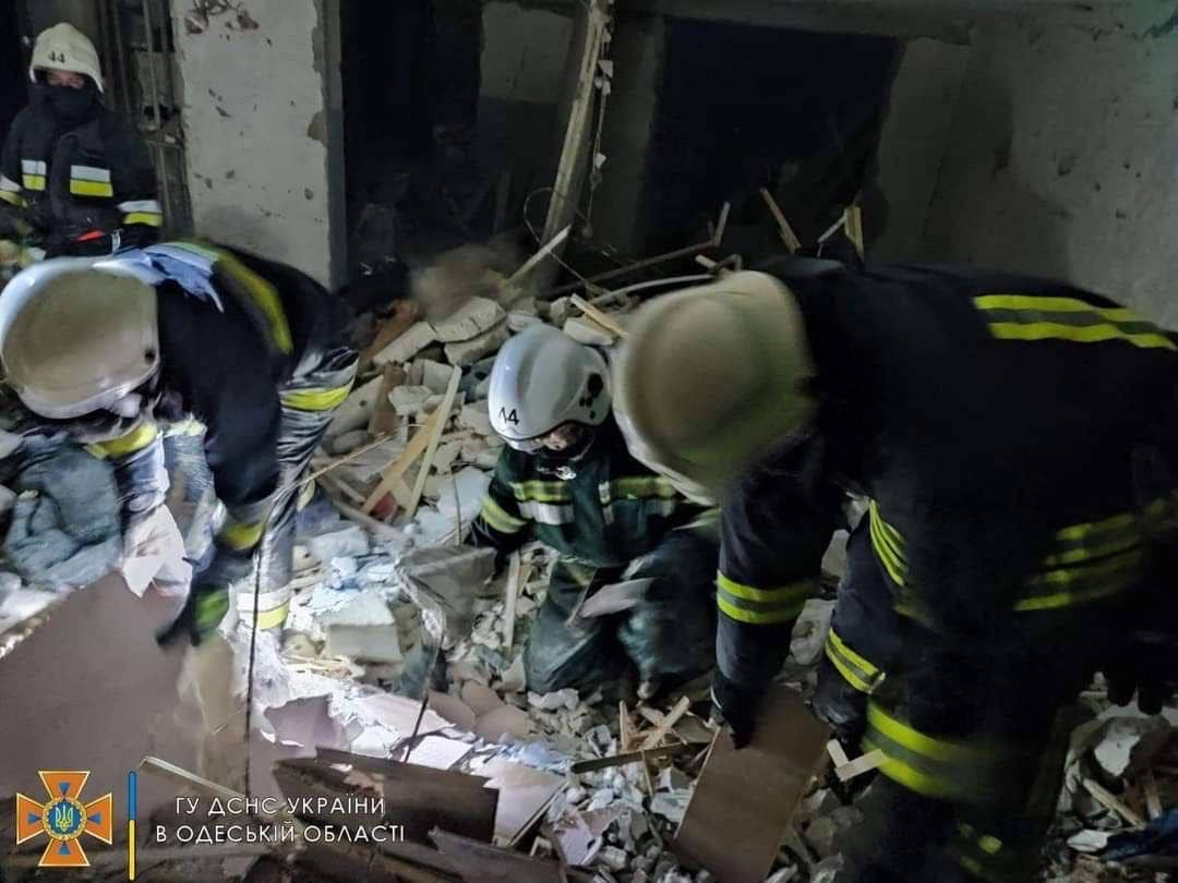 Rescuers sift through the ruins of a building, with the location given as the Belgorod-Dniester region, near Odesa. <em>SES</em>