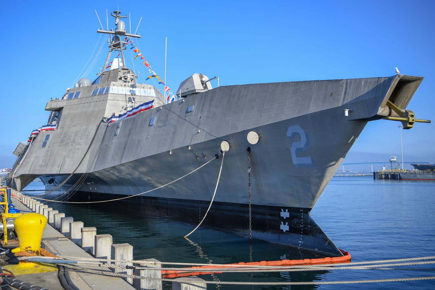 USS <em>Independence</em> (LCS-2) is moored alongside the pier during its decommissioning ceremony at Naval Base San Diego, on July 29, 2021. <em>U.S. Navy photo by Mass Communication Specialist 1st Class Jason Abrams/Released</em>
