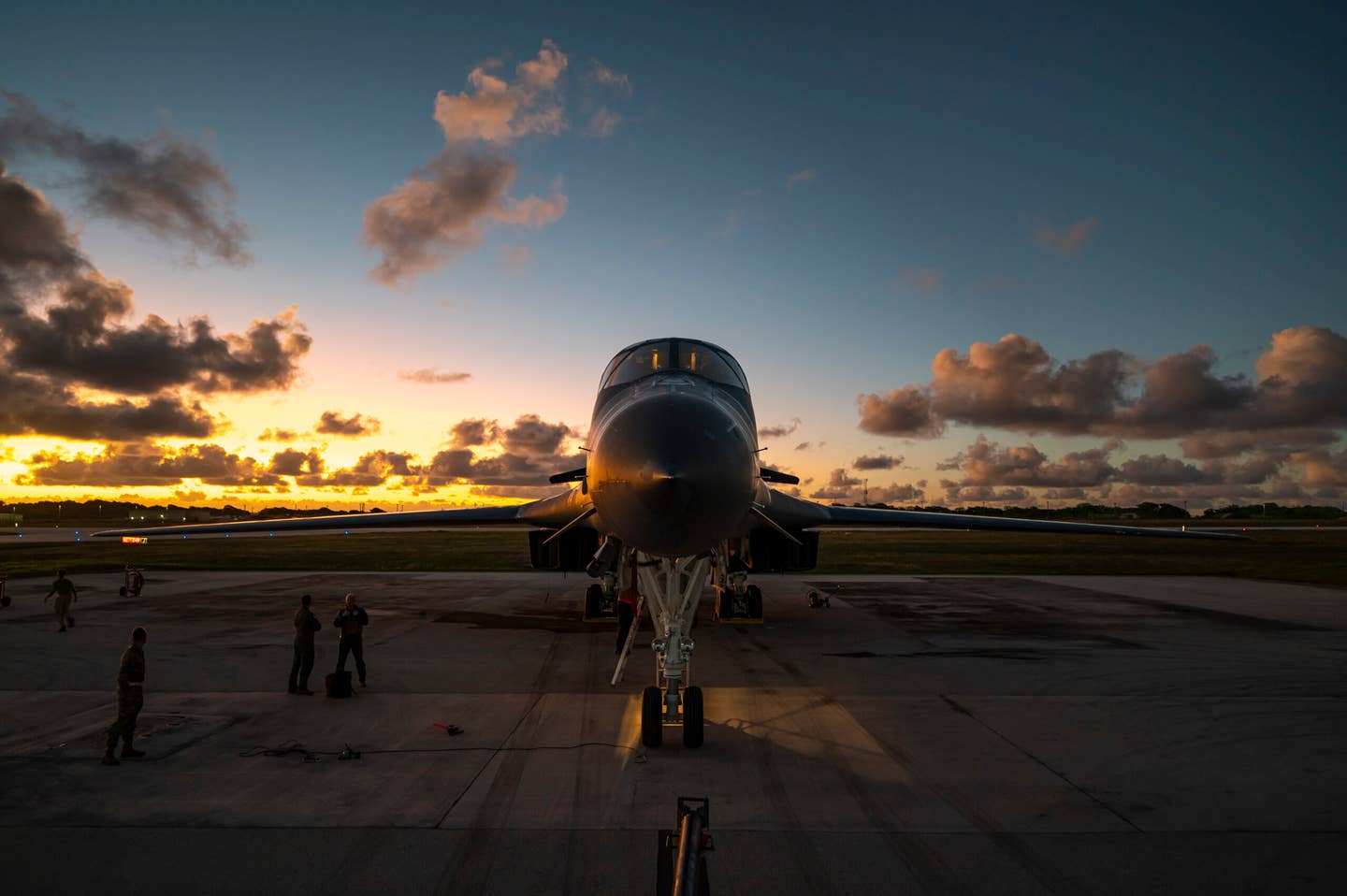 Airmen assigned to the 28th Aircraft Maintenance Squadron, Ellsworth Air Force Base, perform a post-flight inspection on a B-1B at Andersen Air Force Base, after participating in a Bomber Task Force integration mission, June 6, 2022. <em>U.S. Air Force photo by Master Sgt. Nicholas Priest</em>