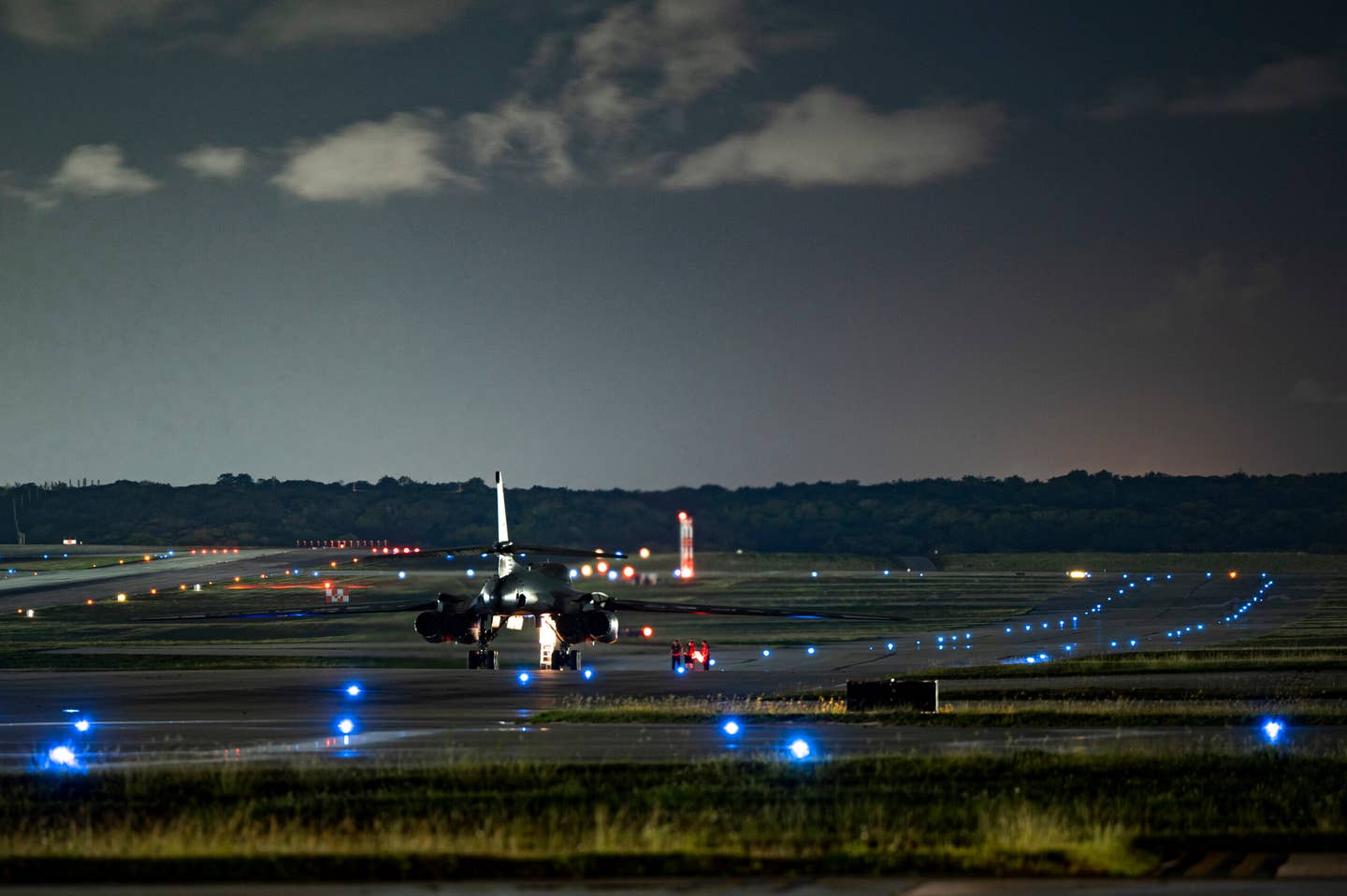 A B-1B waits to be taxied to a parking spot after returning to Andersen Air Force Base, June 22, 2022. <em>U.S. Air Force photo by Master Sgt. Nicholas Priest</em>