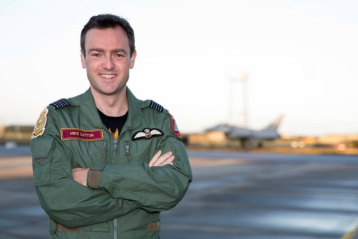 Commander of 1 (Fighter) Squadron, Wg. Cdr. Mike Sutton outside the squadron hangar at RAF Lossiemouth in 2014. <em>Crown Copyright</em>