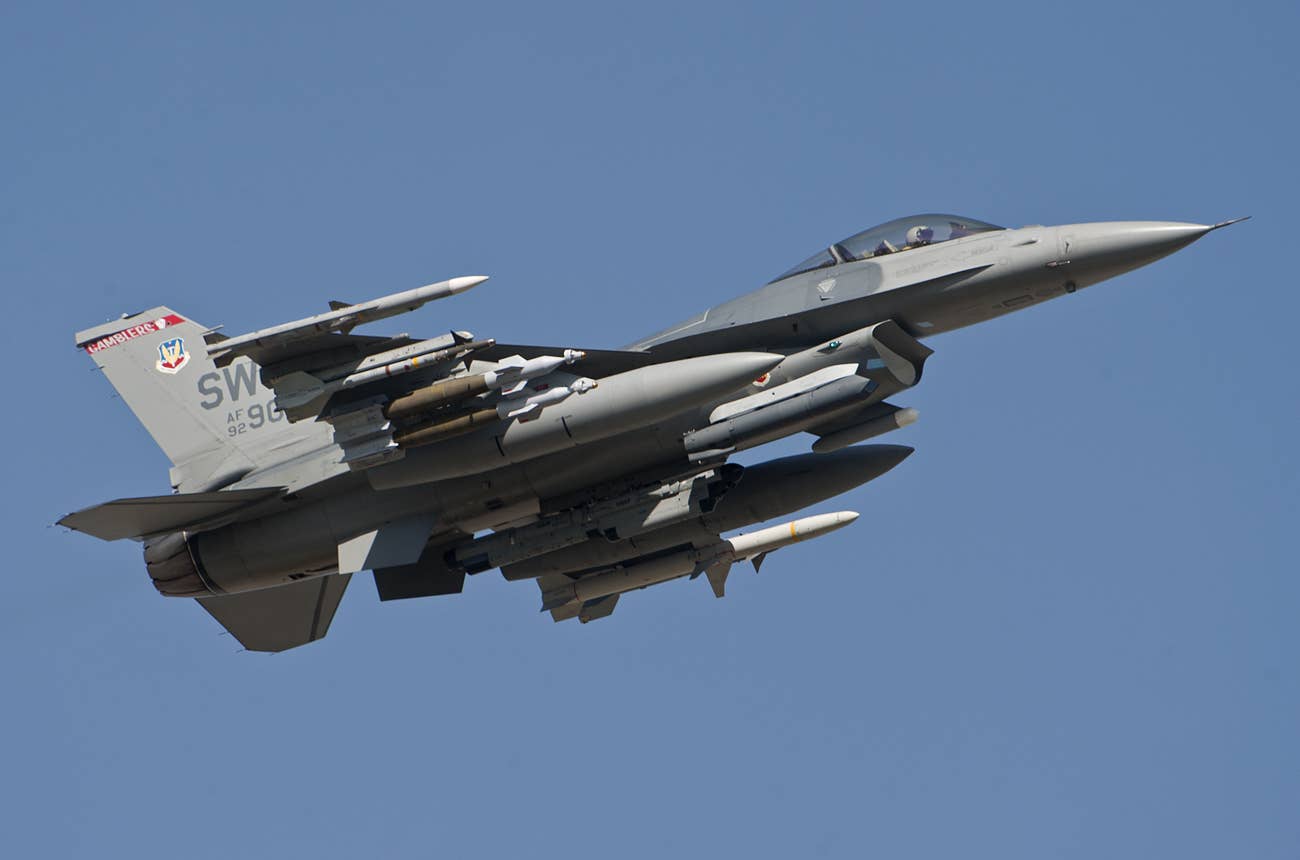 An F-16CM Fighting Falcon assigned to the 77th Expeditionary Fighter Squadron, which specializes in the suppression and destruction of enemy air defenses. <em>U.S. Air Force</em>
