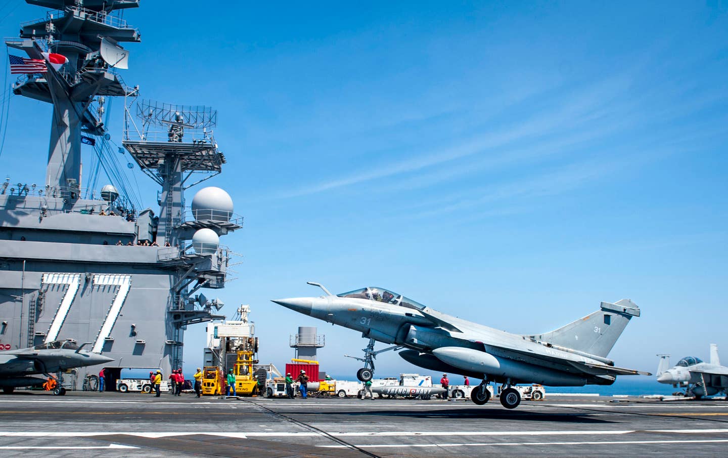 A French Navy Rafale M lands during flight operations aboard the aircraft carrier USS <em>George H.W. Bush</em> (CVN-77). <em>U.S. Navy photo by Mass Communication Specialist 3rd Class Brooke Macchietto/Released</em>