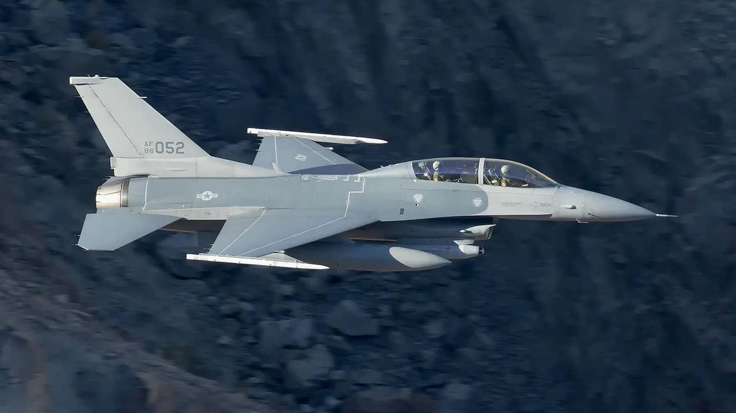 An F-16D, likely among those that fly from Area 51, is seen here zipping through 'Star Wars Canyon' in California 2017. <em>David Atkinson</em>